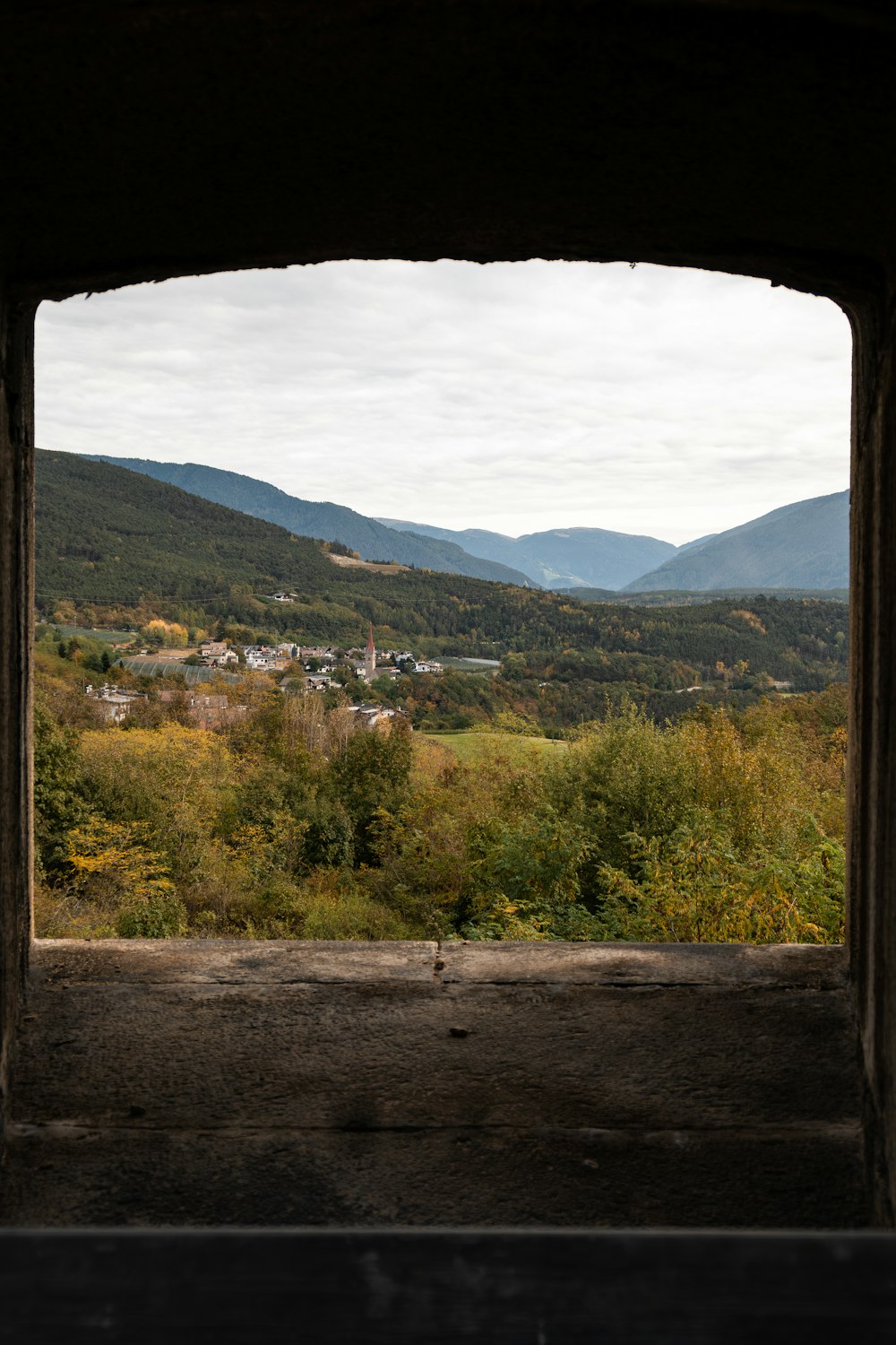 a view of a valley through a window