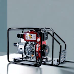 a red and black engine sitting on top of a table