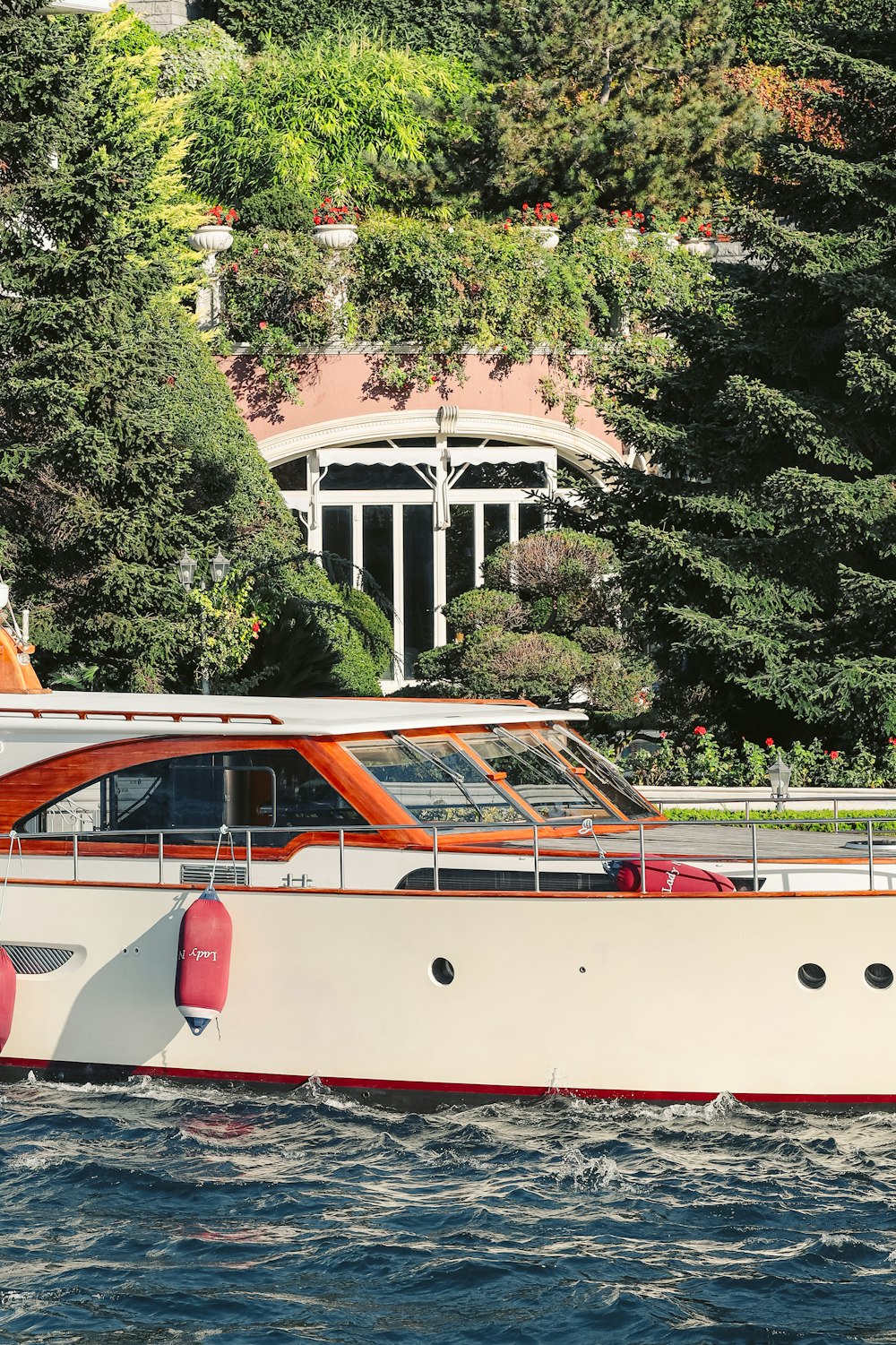 a large white boat floating on top of a body of water