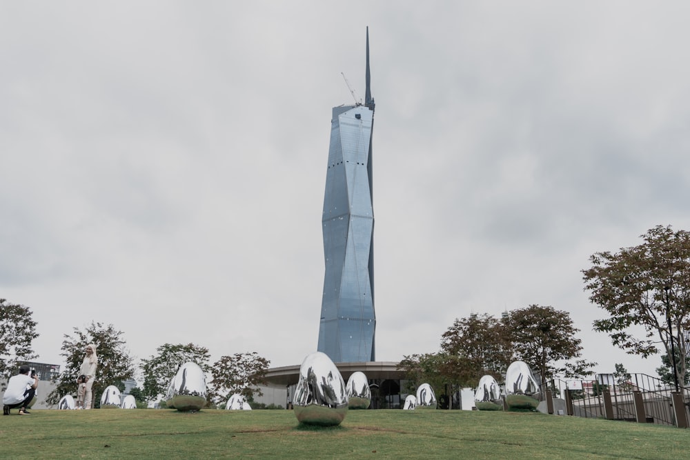 a very tall building with a very tall tower in the background