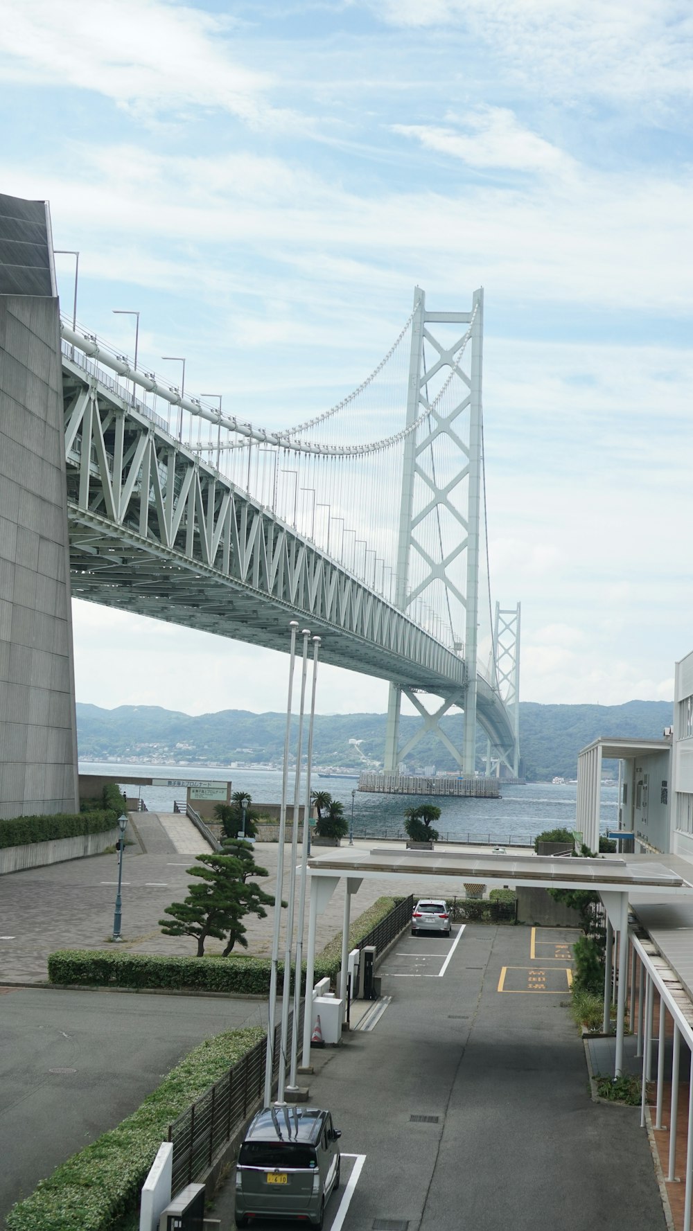 a view of a bridge from a parking lot