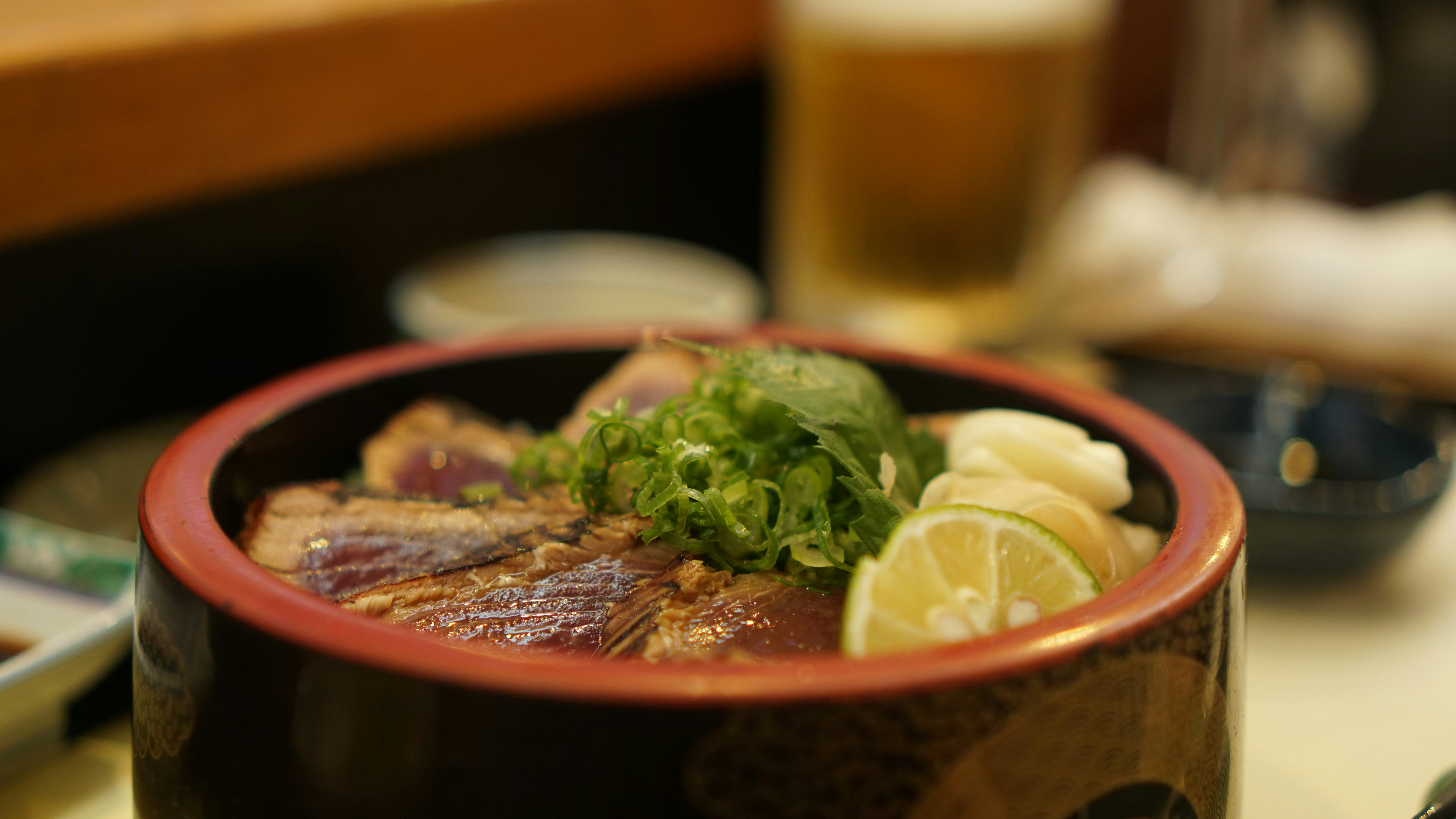 a close up of a bowl of food on a table