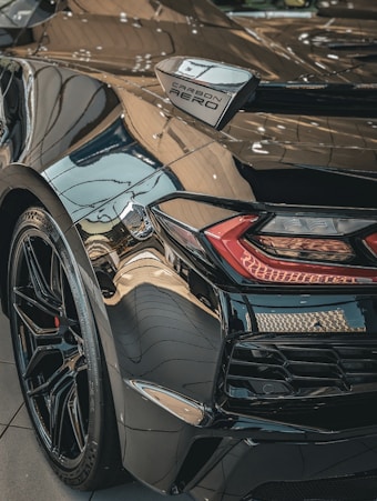 A sleek car outfitted with Maxton Design ABS and carbon fiber exterior accessories, highlighting the brand's professional polish.