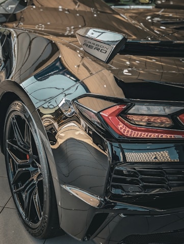 A sleek car showcasing a high-quality paint protection film.