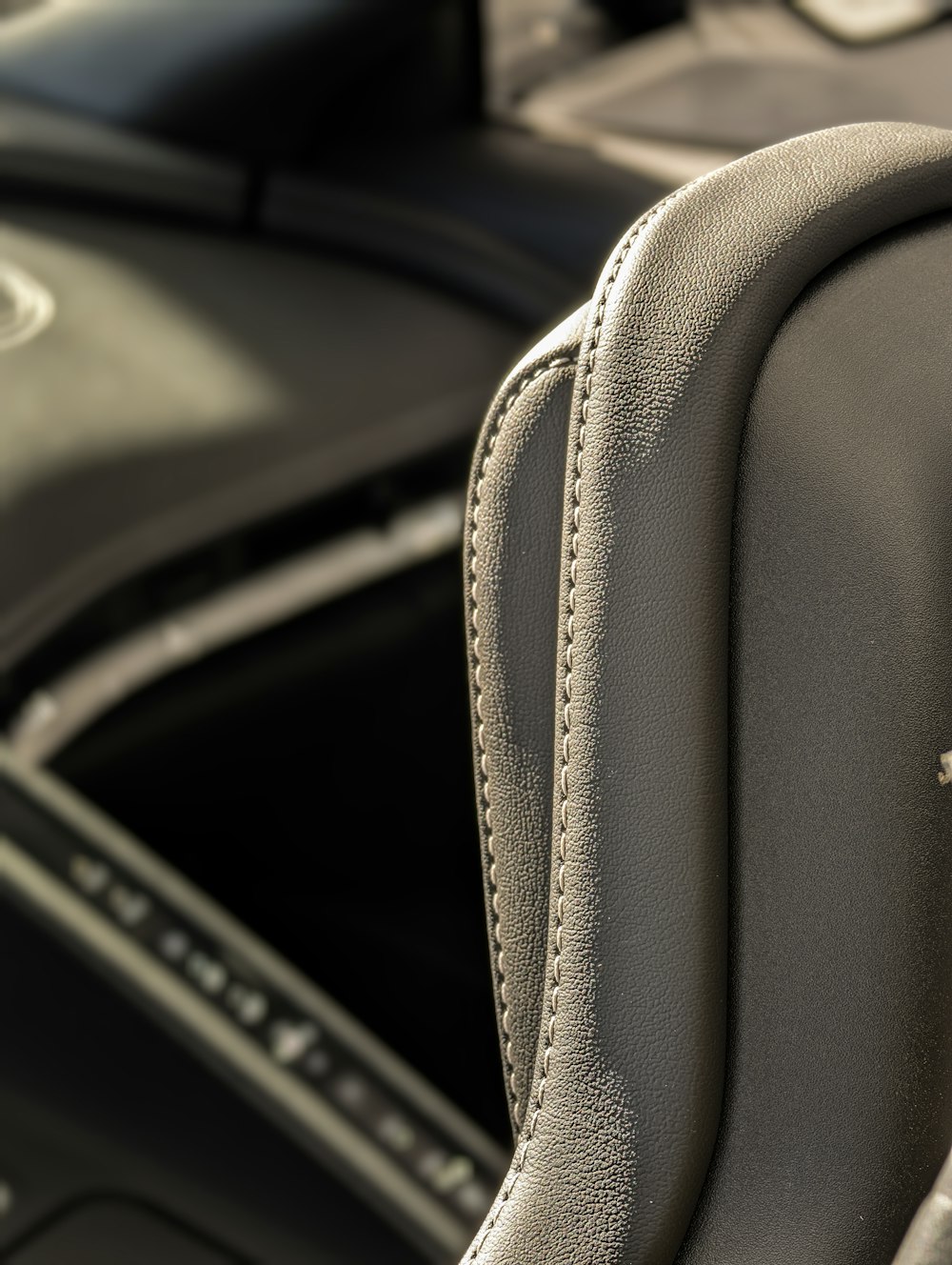 the interior of a car with a steering wheel