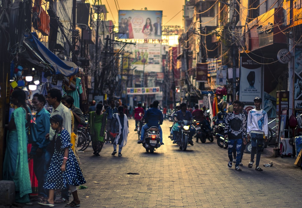 a group of people walking down a street