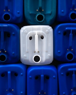 A vibrant display of plastic containers in various shapes.