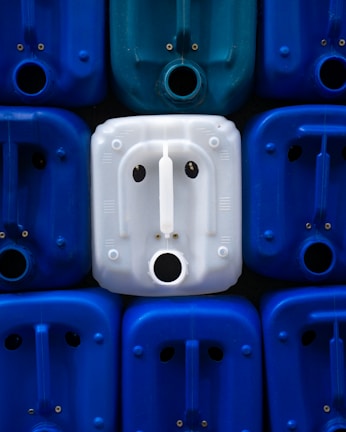 Rotomolded plastic containers neatly arranged in the factory showroom.