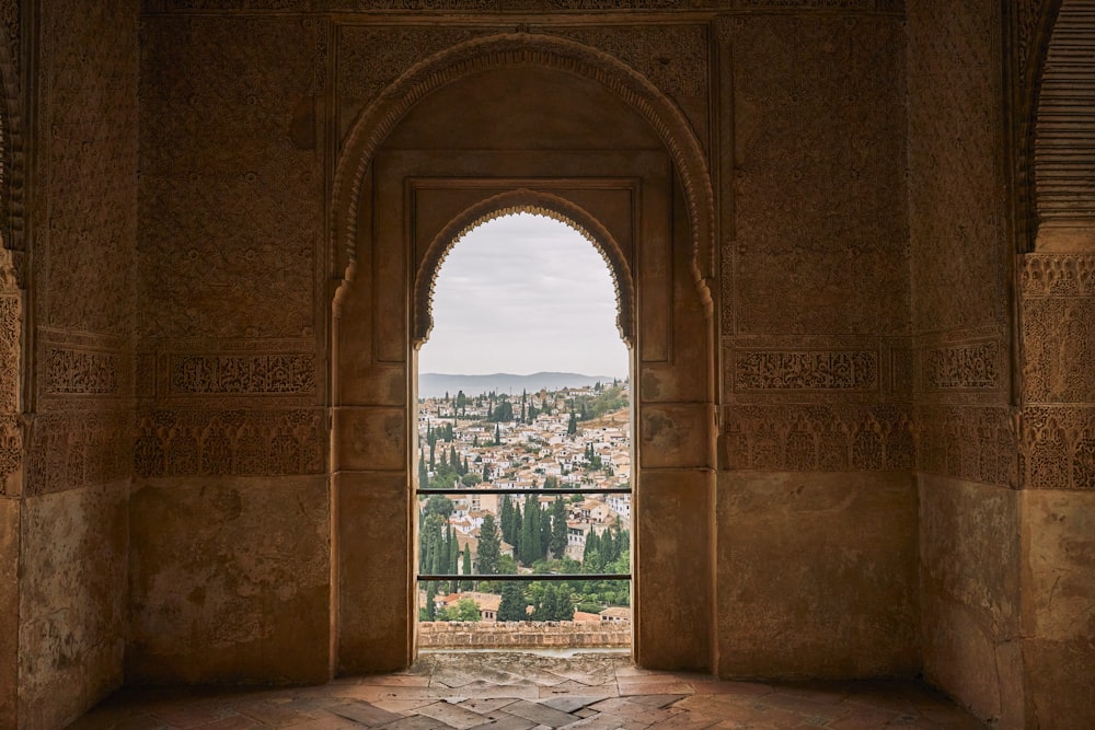 a view of a city from a window in a building