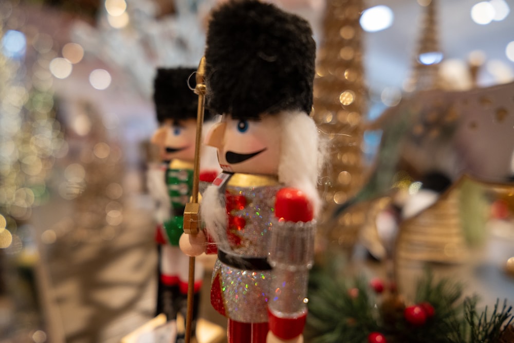 a nutcracker figurine in a christmas display