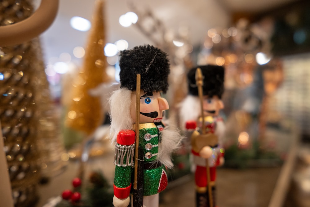 a row of nutcrackers sitting on top of a counter