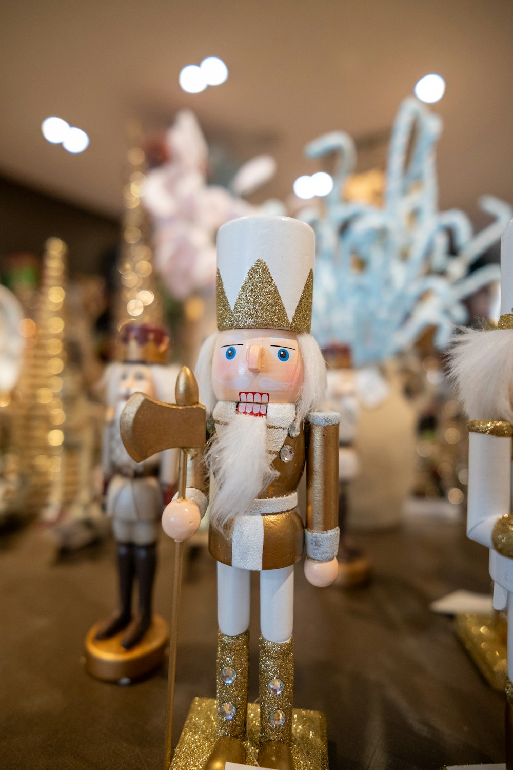 a nutcracker figurine is standing in front of other nutcracker