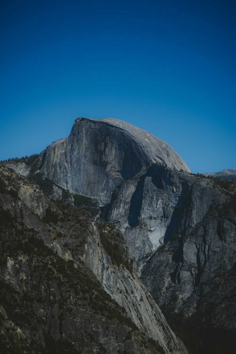 a mountain with a very tall rock face