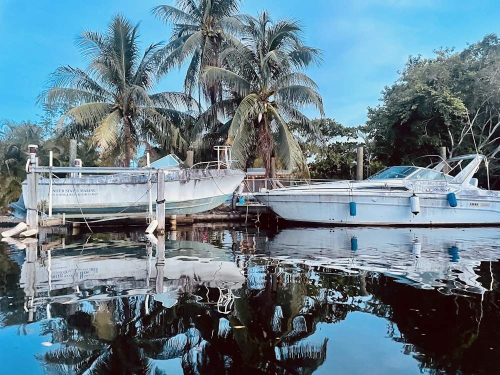 a couple of boats that are sitting in the water