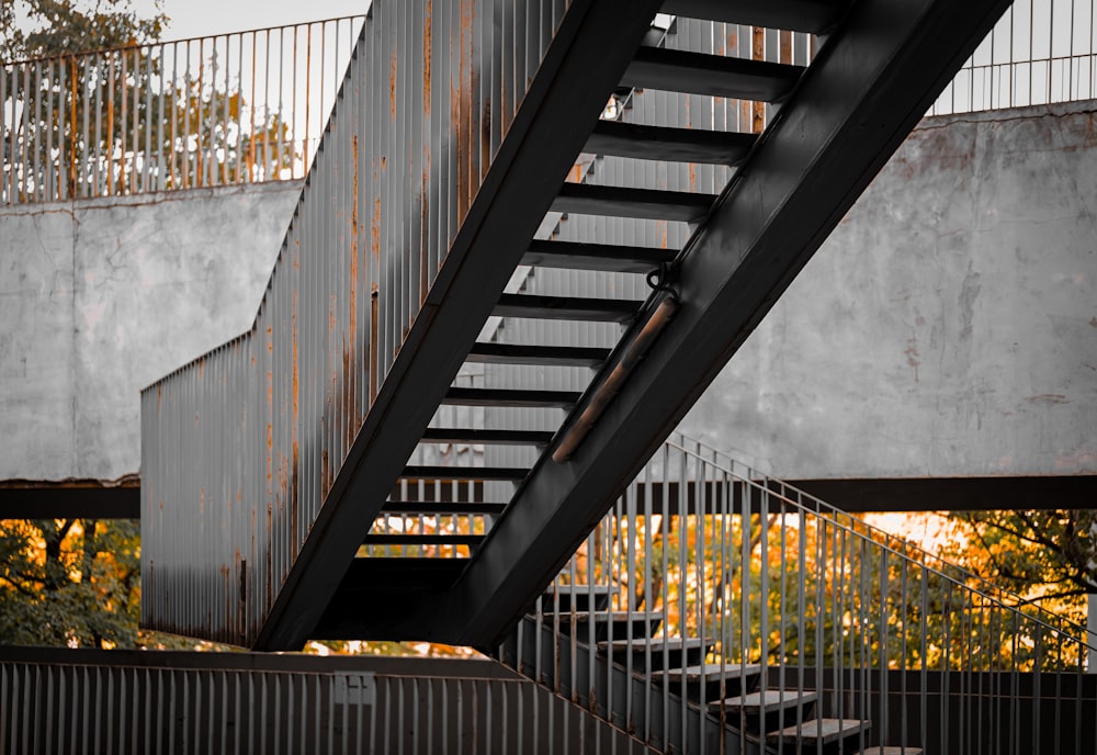 a metal staircase going up to a building