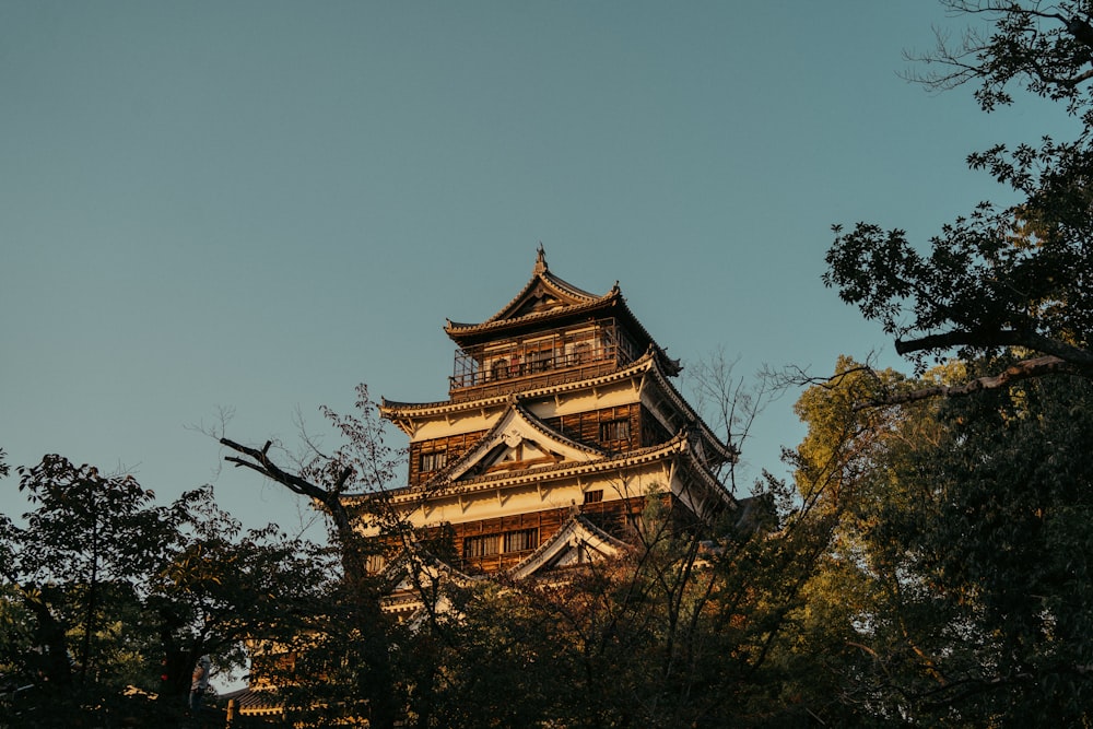 a tall tower with a clock on the top of it