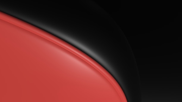 A sleek, glossy design featuring a smooth, curved red surface bordered by a black, voluminous shape. The contrast between the warm red and the cool black creates a modern and abstract aesthetic.