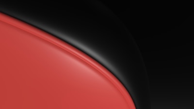 A sleek, glossy design featuring a smooth, curved red surface bordered by a black, voluminous shape. The contrast between the warm red and the cool black creates a modern and abstract aesthetic.