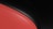 A sleek, glossy design featuring a smooth, curved red surface bordered by a black, voluminous shape. The contrast between the warm red and the cool black creates a modern and abstract aesthetic.