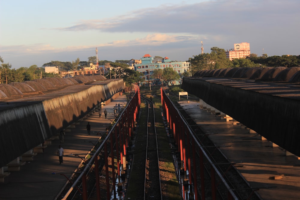 a view of a train yard with a sky background