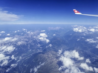 A breathtaking aerial view of mountains under a clear sky from an ultralight.