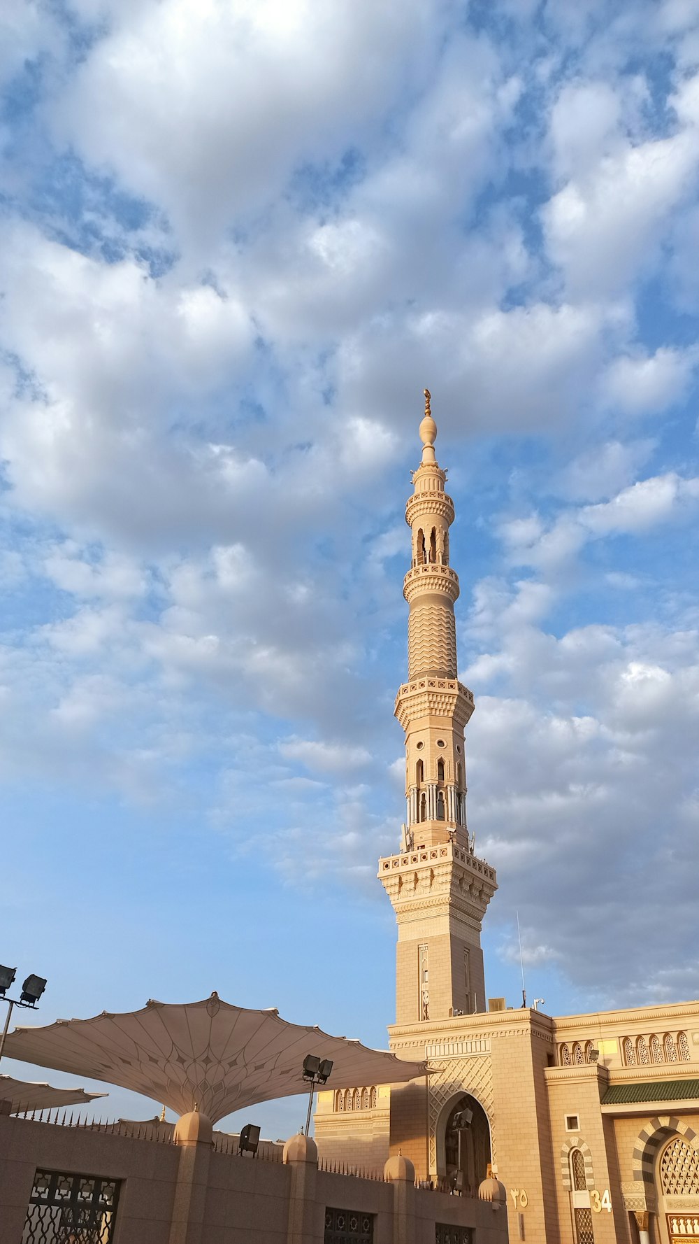 a tall building with a clock on the top of it