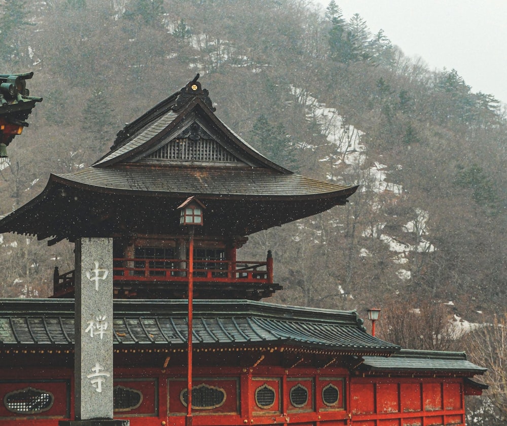 a red building with a clock tower on top of it