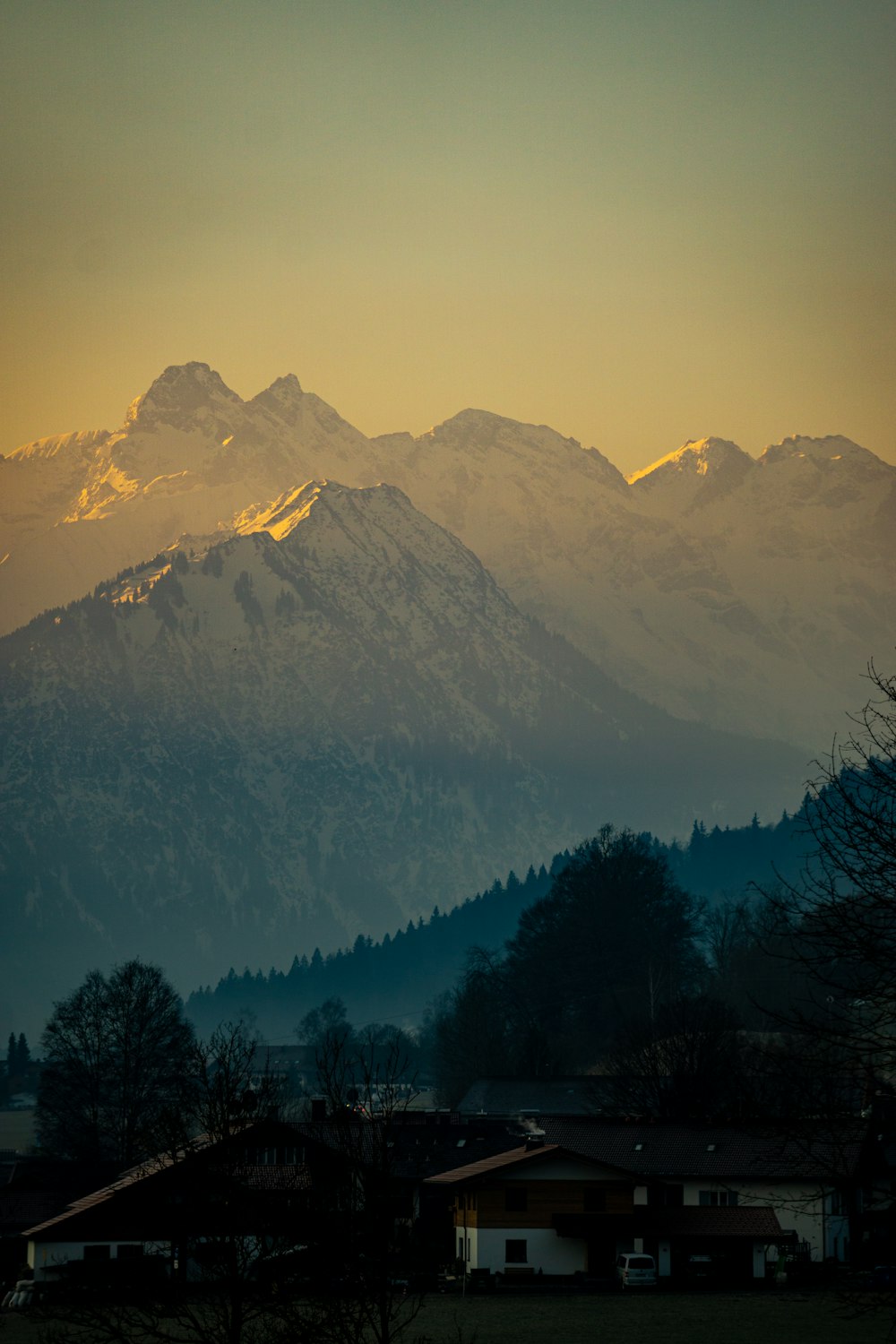 a view of a mountain range at sunset