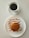 A bright, inviting breakfast table set with pancakes and coffee.