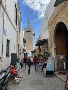 Traditional Medina street with local shops and rich textures.