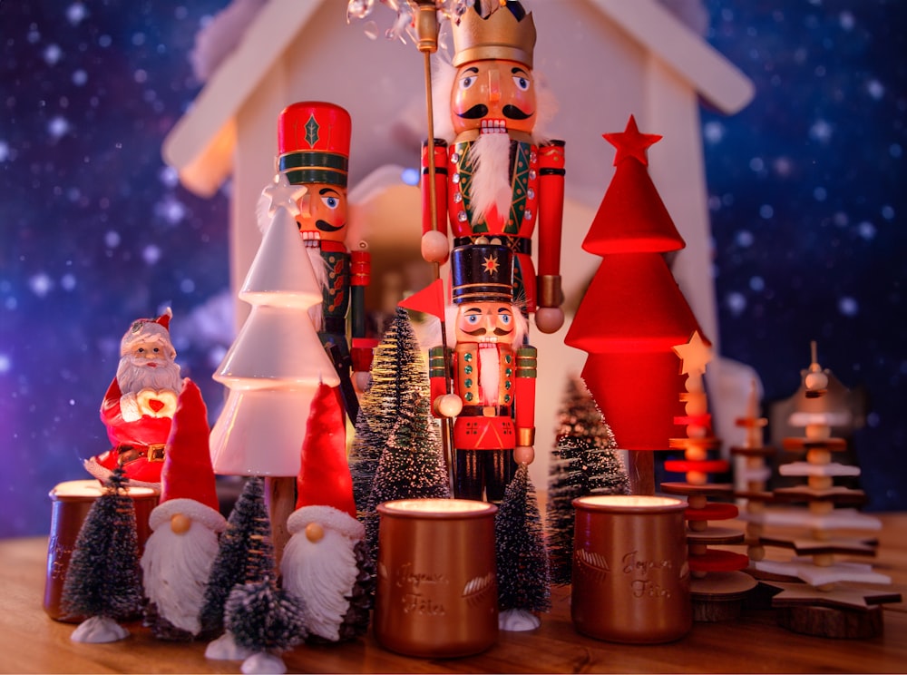 a group of nutcrackers sitting on top of a wooden table