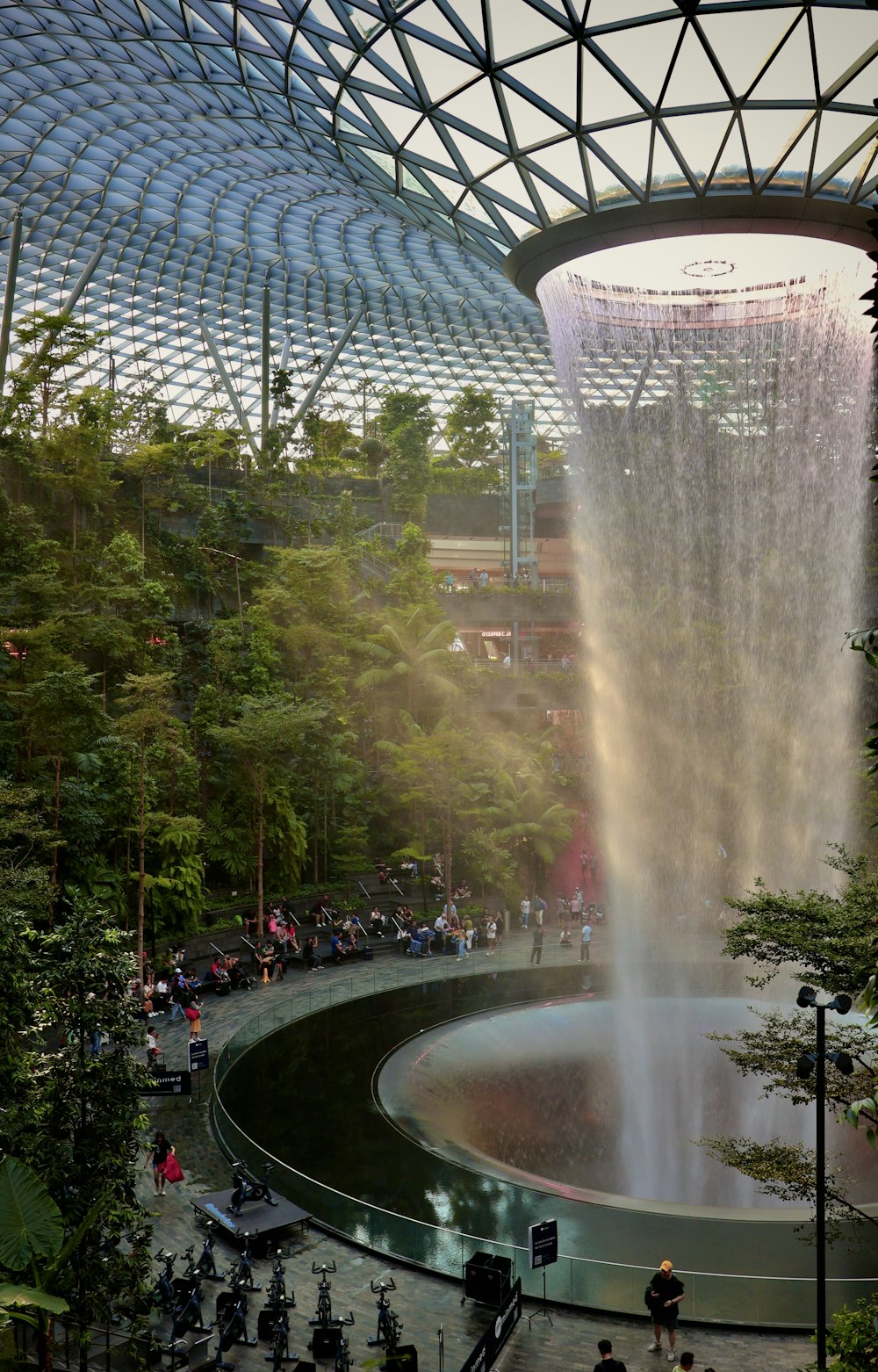 a view of a fountain in the middle of a park