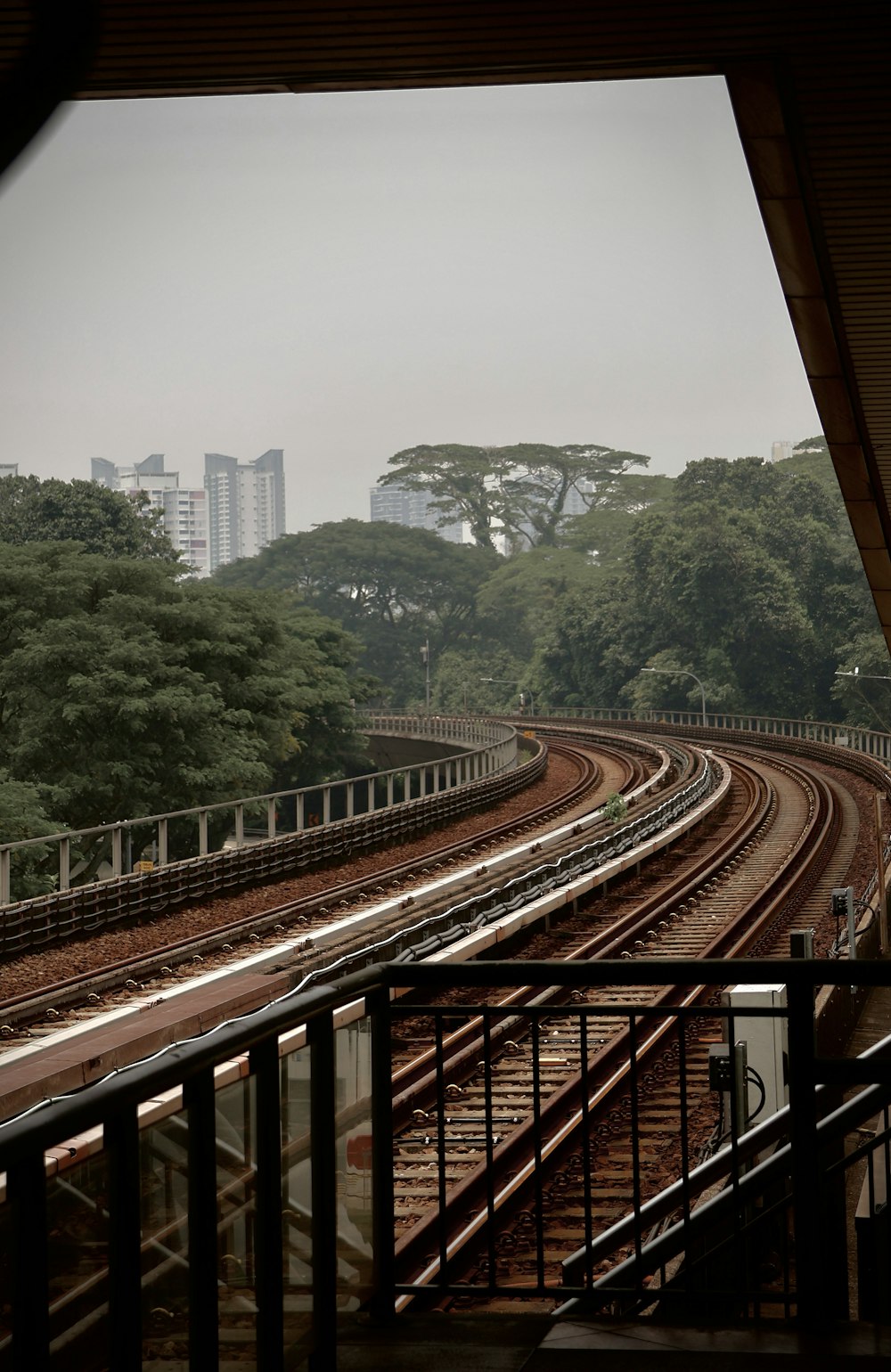 a view of a train track from a platform
