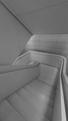 Contemporary staircase with minimalist design and monochrome tones.