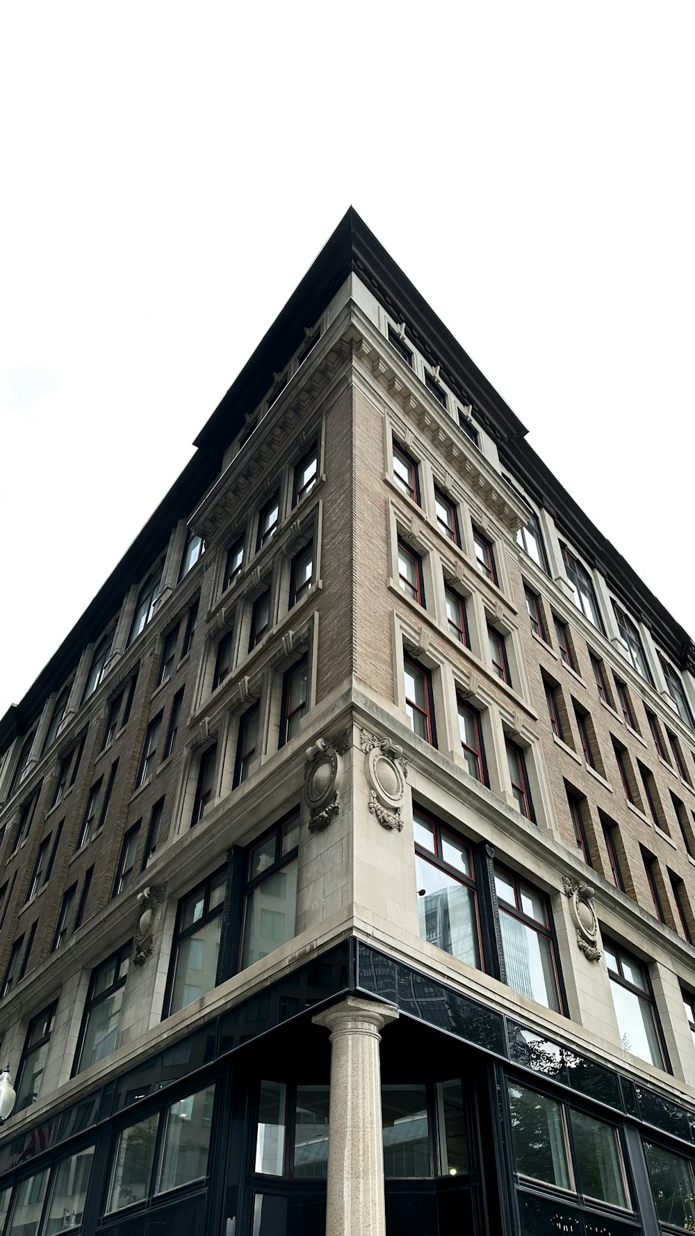 a tall building with a clock on the top of it