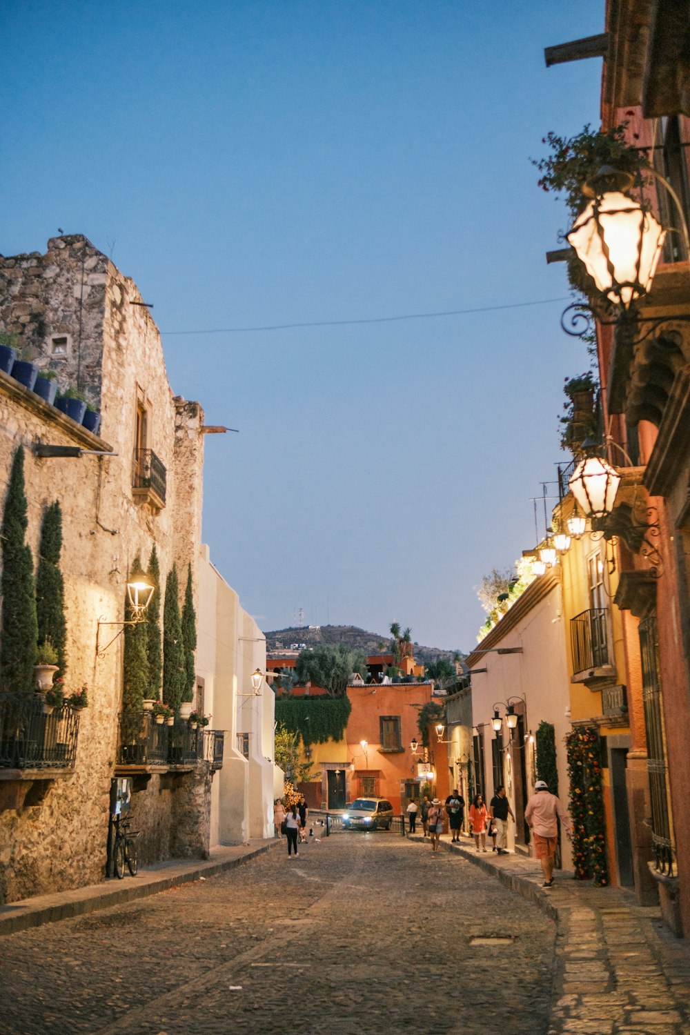 a cobblestone street in a small town