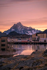 A vibrant collage showing Calabria's landscapes, local markets, and cultural landmarks under a warm sunset.