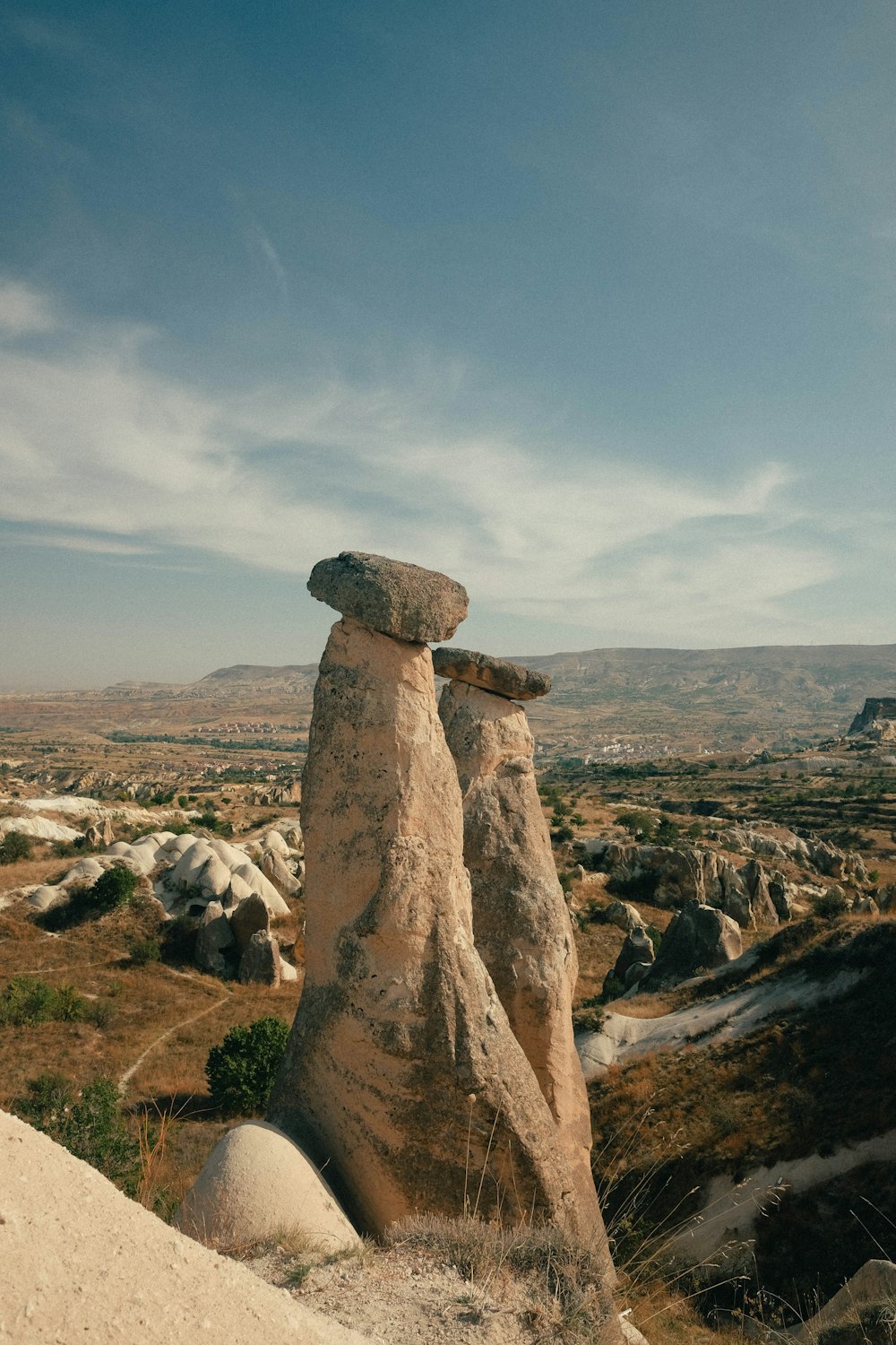 a rock formation in the middle of the desert