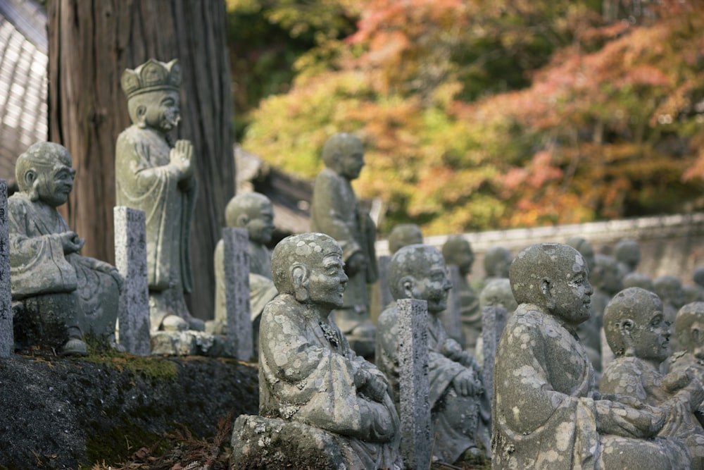 a group of statues sitting next to each other