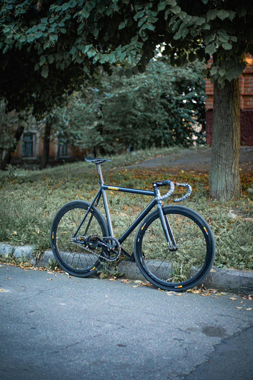 a bike parked on the side of the road