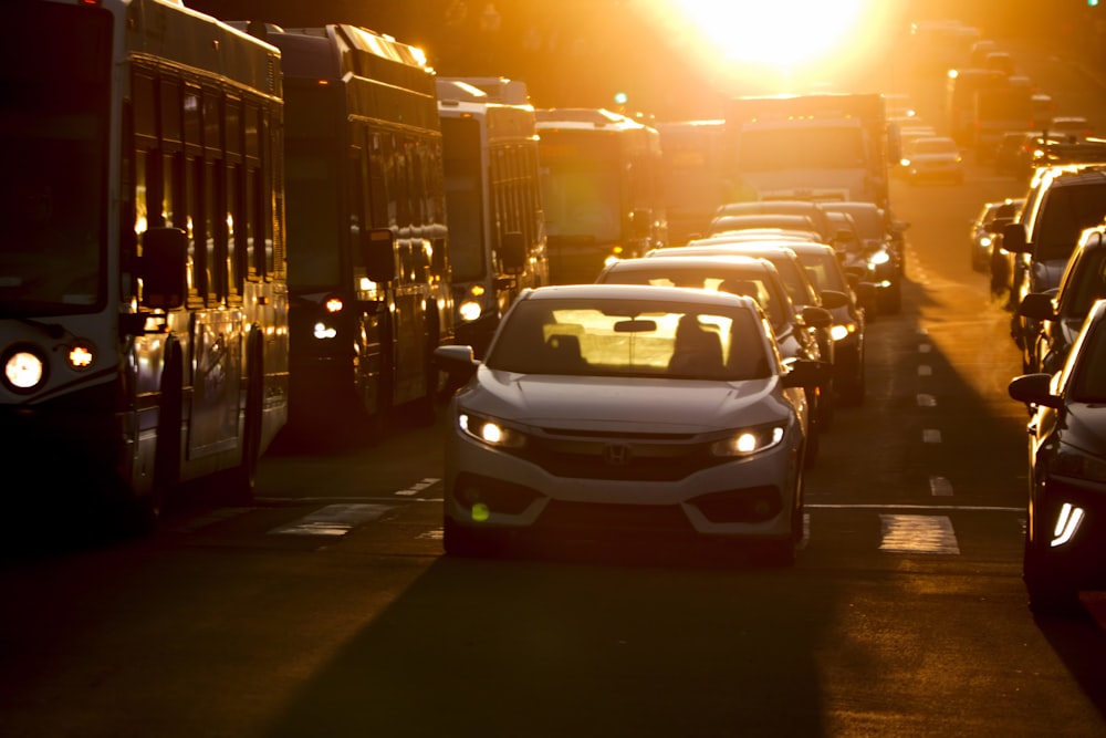 a lot of cars that are sitting in the street