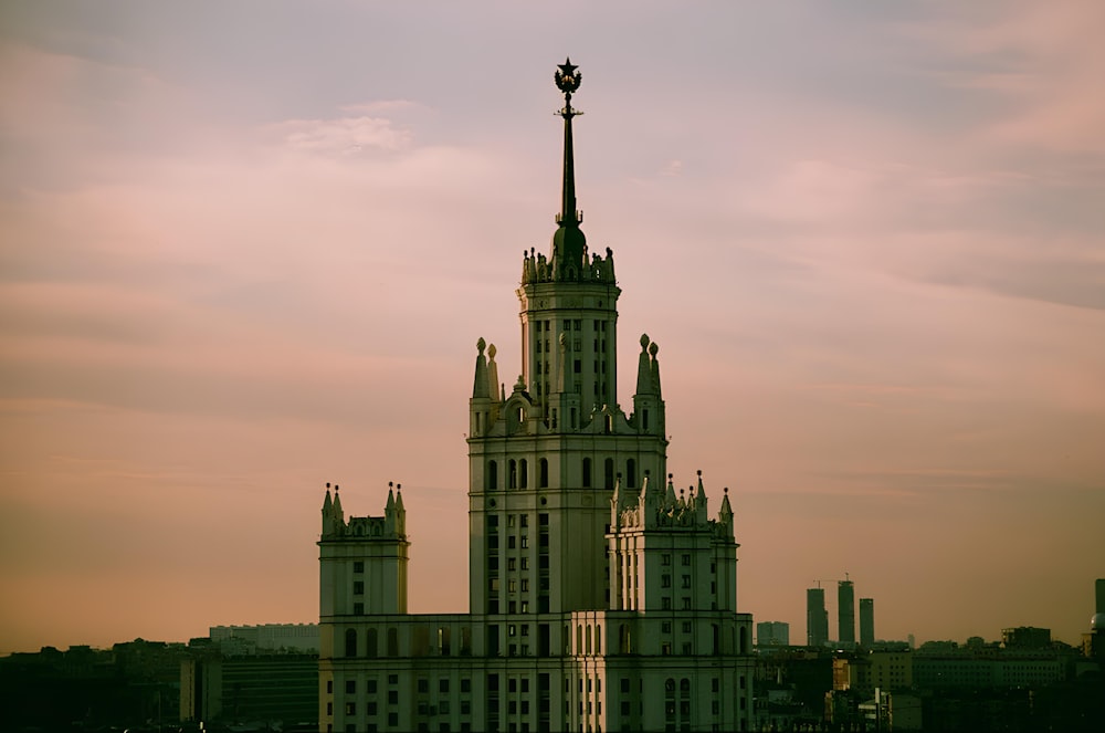 a very tall building with a clock on top