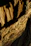 Close-up of a handcrafted iron and wood product from forjaviva, highlighting texture and detail.