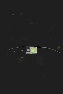 Dark-themed cockpit view showing real-time cyber threat maps and alerts.