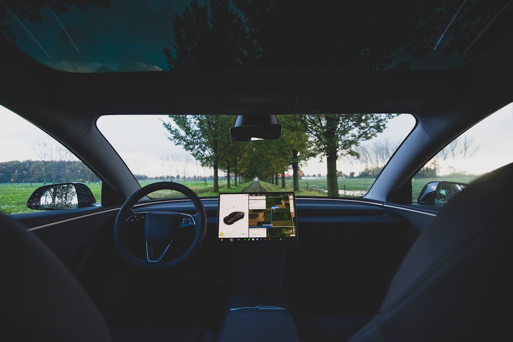 a view of a car from inside the car