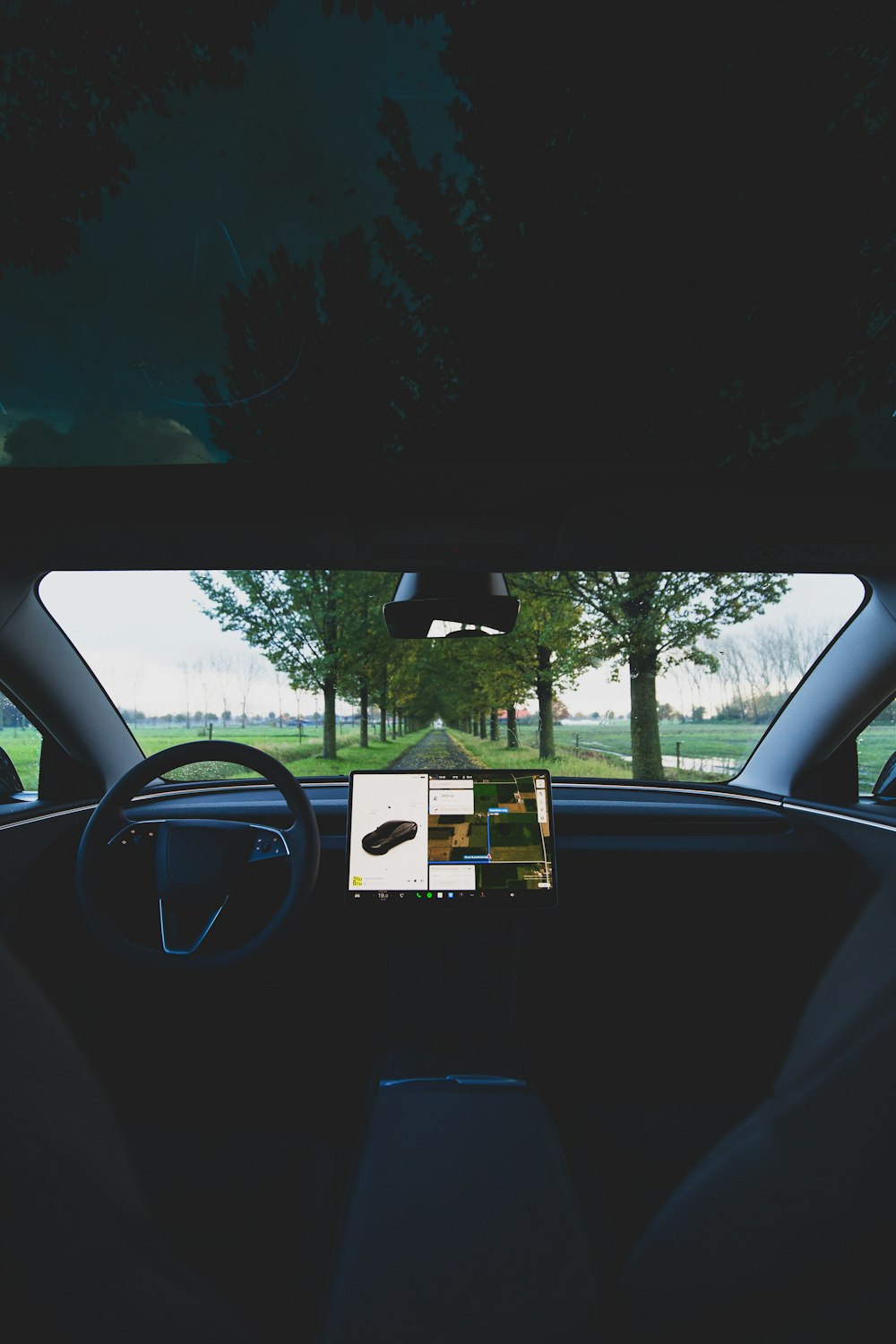 a view of a car from inside the car