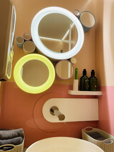 A sleek bathroom setup featuring Hindware and Cera sanitary fittings shining under soft lighting.