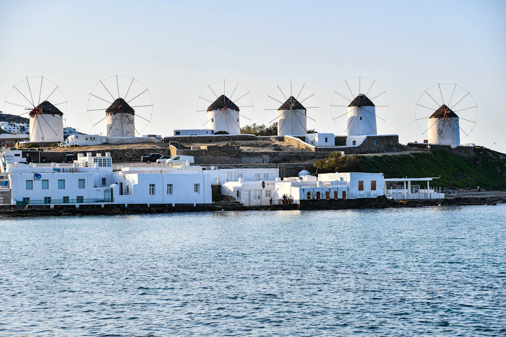The row of white windmills above the sea on Mykonos