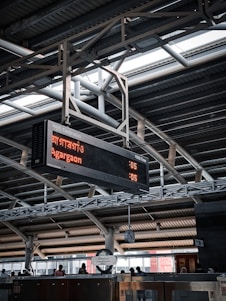 A dynamic control room with screens showing metro, tram, light rail, and train schedules in real-time.