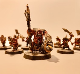 Close-up of detailed character illustrations from the dark fantasy RPG manual.